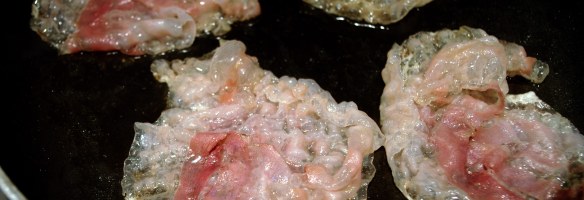 Pancetta arrotolata in cottura